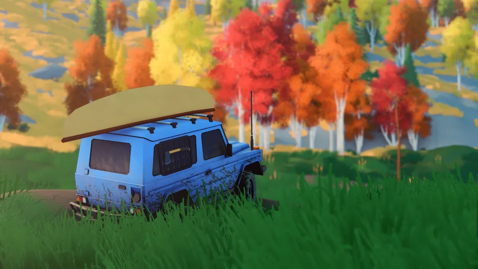 Muddy blue 4x4 with a canoe on its roof in an autumn forest