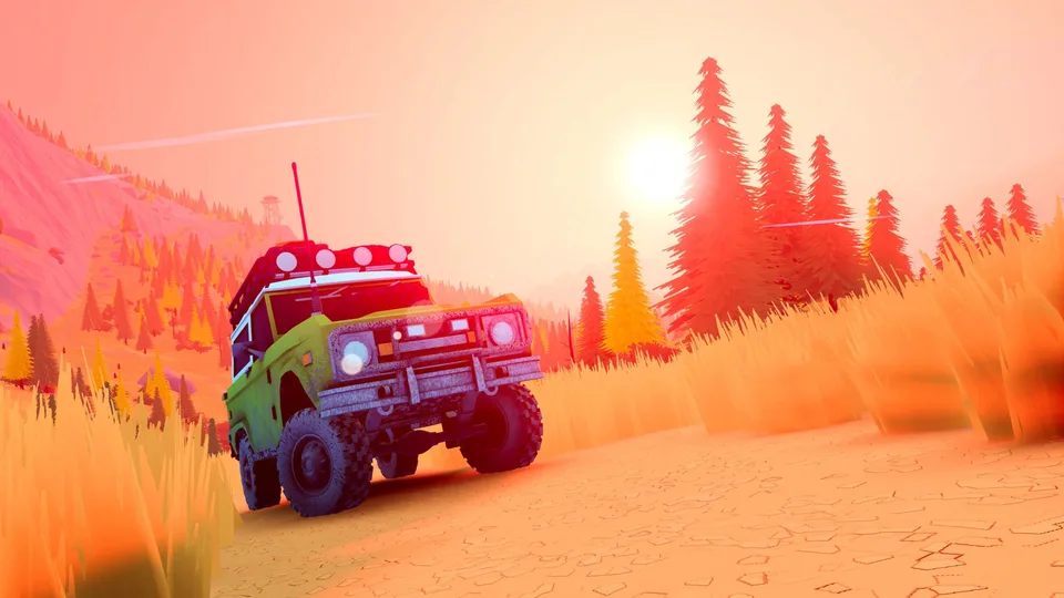 Golden sunset light over a classic 4x4 on an over the hill wilderness trail
